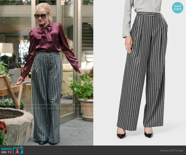 Giorgio Armani Roomy Pinstripe Trousers worn by Anna Delvey (Julia Garner) on Inventing Anna
