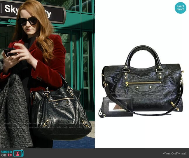 Balenciaga Large City Bag worn by Anna Delvey (Julia Garner) on Inventing Anna