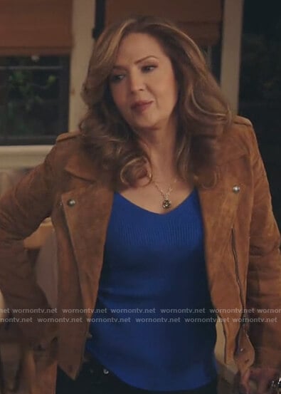 Brown suede moto jacket on Kenan