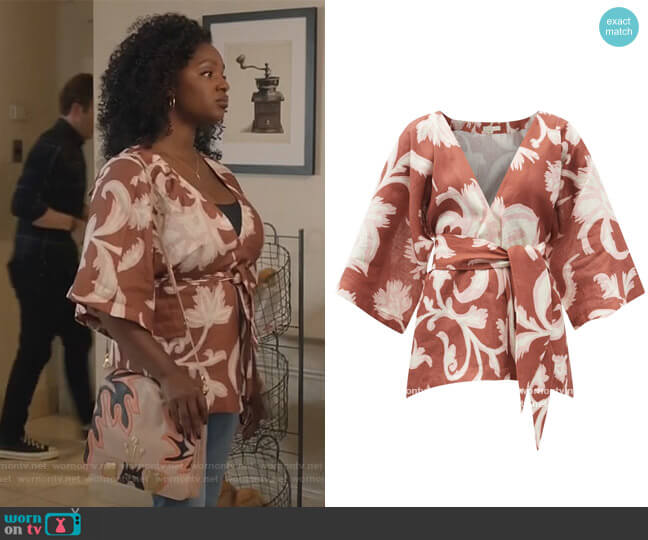 Cala de la Cruz Carina floral-print linen wrap top worn by Bridgette Pierce (Yaani King Mondschein) on The Kings of Napa