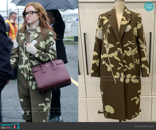 Dries van Noten Floral Khaki Coat worn by Anna Delvey (Julia Garner) on Inventing Anna