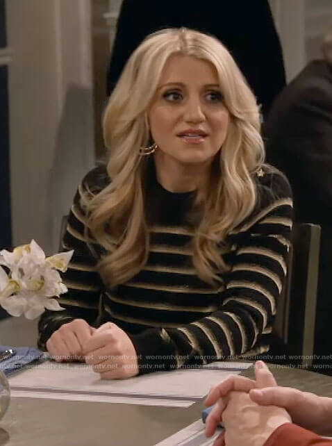 Gina’s black and gold striped sweater on B Positive