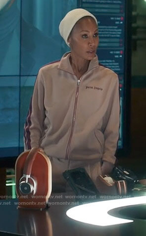 Jessie’s pink Palm Angels track suit on The Equalizer
