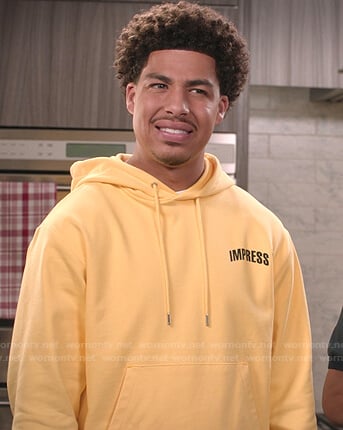 Junior’s yellow Impress hoodie on Black-ish
