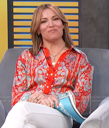 Kit’s red floral blouse on Access Hollywood