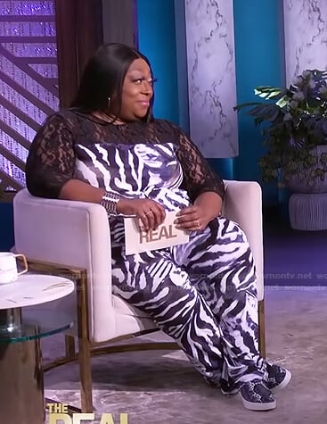Loni’s zebra print lace jumpsuit on The Real