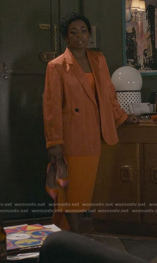 Neff’s orange strapless midi dress and orange blazer on Inventing Anna