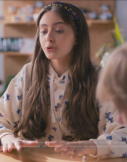 Nellie’s white butterfly print hoodie on Sweet Magnolias