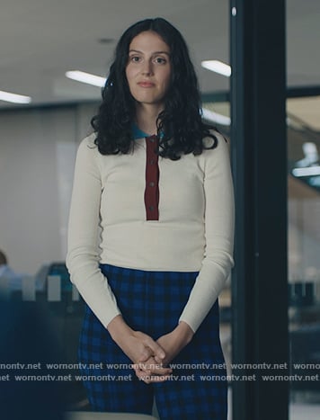 Rian’s white colorblock sweater and pants on Billions