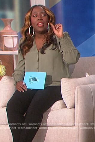 Sheryl’s green v-neck blouse on The Talk