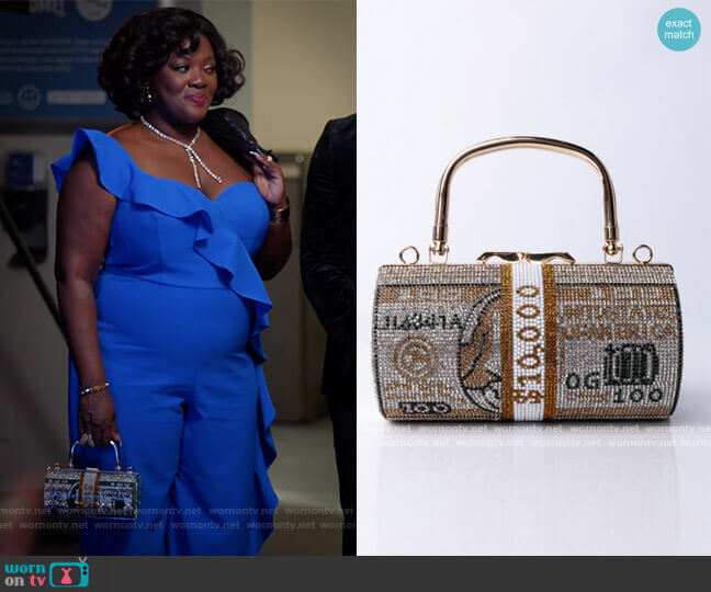 Shop Akira Rolls on Rolls Rhinestoned Money Clutch worn by Yvette King (Heather Alicia Simms) on The Kings of Napa