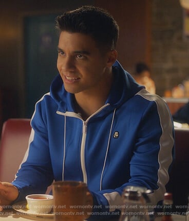 Vivek’s blue stripe track jacket on Grown-ish