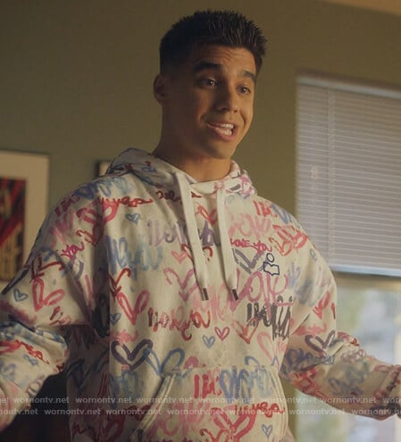 Vivek’s white heart print hoodie on Grown-ish