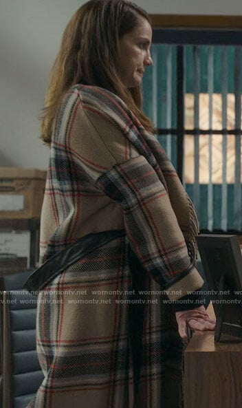 Vivian’s plaid fringed coat on Inventing Anna