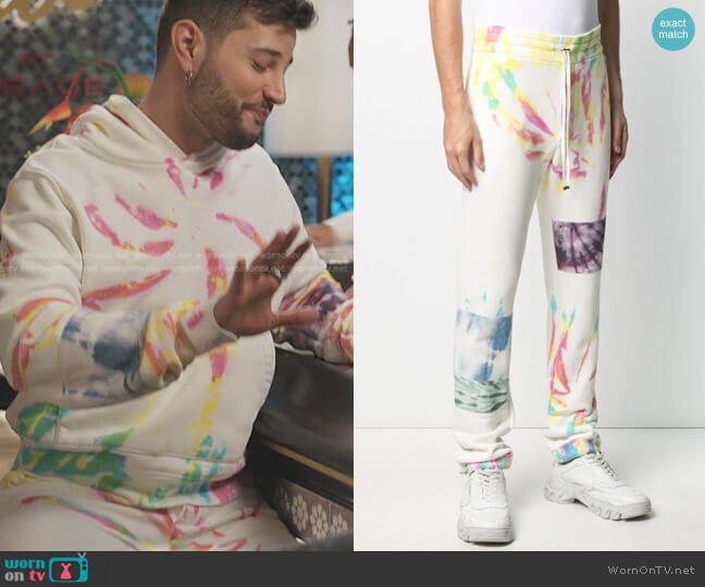 Amiri Tie-Dye Print Cotton Track Trousers worn by Sam Flores (Rafael de la Fuente) on Dynasty