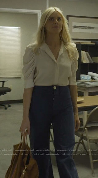 Amy’s off-white puff sleeve button down top on Pivoting