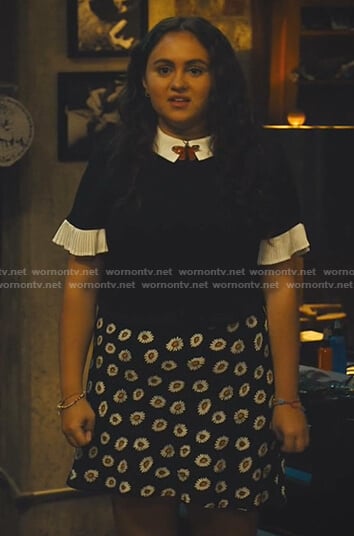 Annabelle’s black contrast pleated sleeve top and floral skirt on Naomi