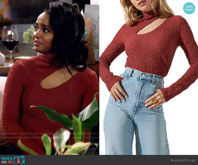 ASTR Asymmetric Cutout Mock Neck Cotton Blend Top in Rust worn by Randi (Kyla Pratt) on Call Me Kat