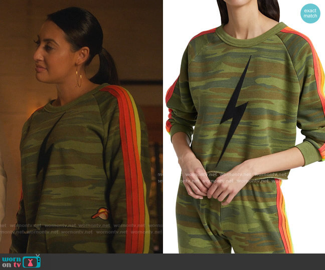 Aviator Nation Bolt Stripe Camo Cropped Sweatshirt worn by Ana Torres (Francia Raisa) on Grown-ish