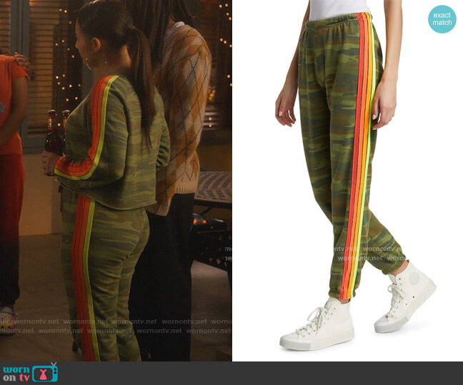Aviator Nation Neon Four-Stripe Sweatpants worn by Ana Torres (Francia Raisa) on Grown-ish