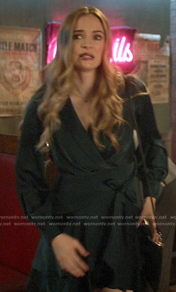 Caitlin’s dark green satin wrap dress on The Flash