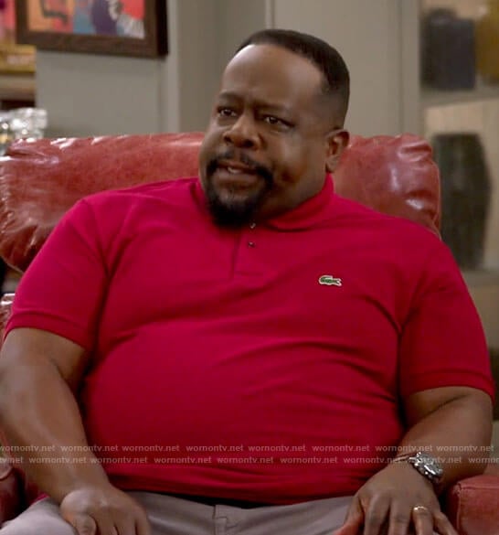 Calvin’s red polo shirt on The Neighborhood