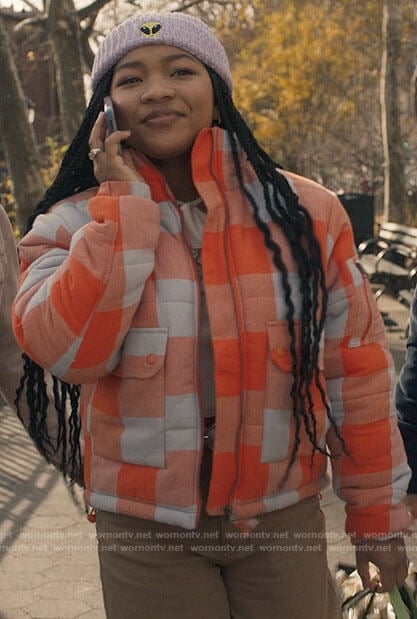 Delilah’s orange checked jacket and alien beanie on The Equalizer