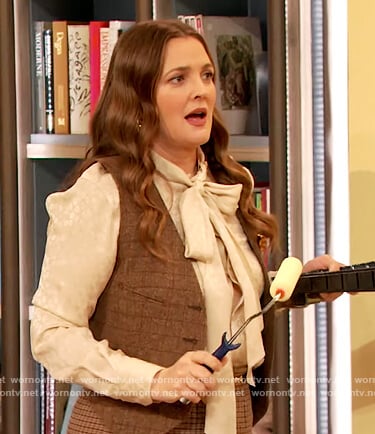 Drew’s ivory satin tie neck blouse on The Drew Barrymore Show