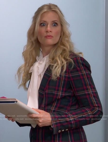 Gemma’s plaid blazer and white tie neck blouse on The Neighborhood