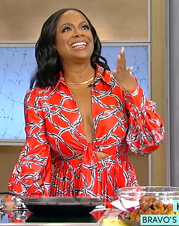 Kandi Burruss’ red printed tie front jumpsuit on Tamron Hall Show