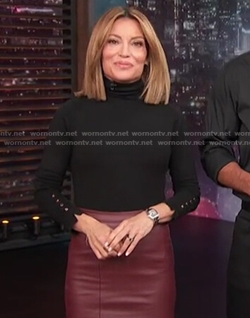 Kit’s black button cuff turtleneck sweater on Access Hollywood