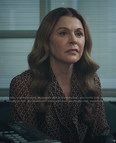 Kit’s brown geometric print tie neck blouse on The Resident