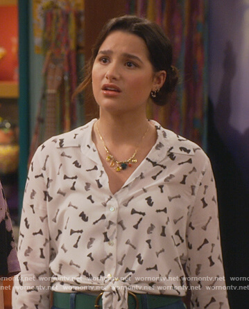 Lex’s white chess piece print blouse on Side Hustle