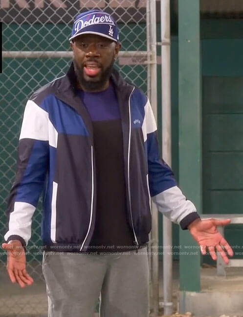 Malcolm’s blue colorblock jacket on The Neighborhood
