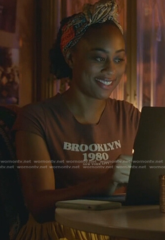 Malika’s brown Brookyln 1980 New York City tee on Good Trouble