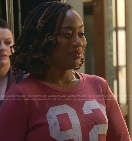 Malika’s red 92 print top on Good Trouble