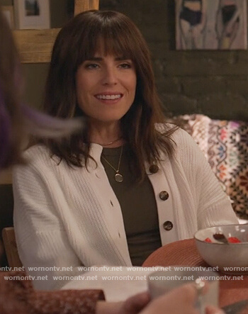 Marina’s white cardigan on Home Economics