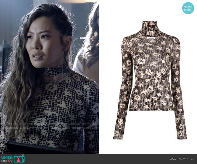 Nanushka Hanny high-neck floral print top worn by Mary Hamilton (Nicole Kang) on Batwoman