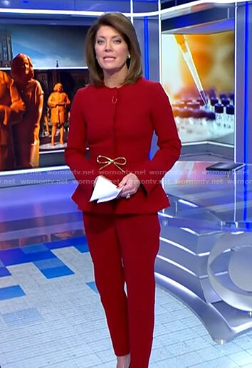 Norah’s red peplum jacket and pants on CBS Evening News
