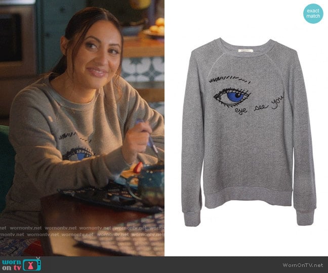 Rag doll LA Eye Sweatshirt worn by Ana Torres (Francia Raisa) on Grown-ish