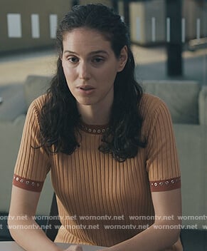 Rian’s beige studded short sleeve sweater on Billions