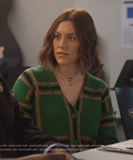 Sara’s green plaid cardigan on Home Economics