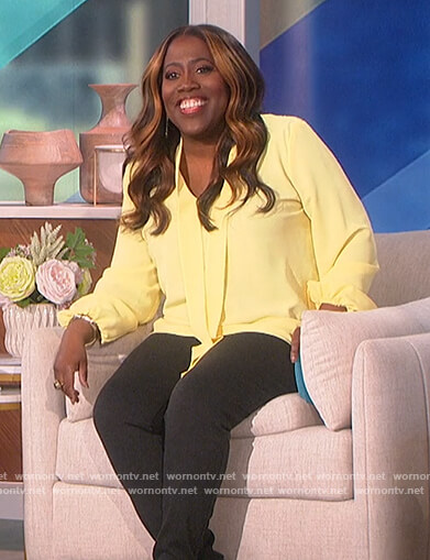 Sheryl’s yellow tie neck blouse on The Talk