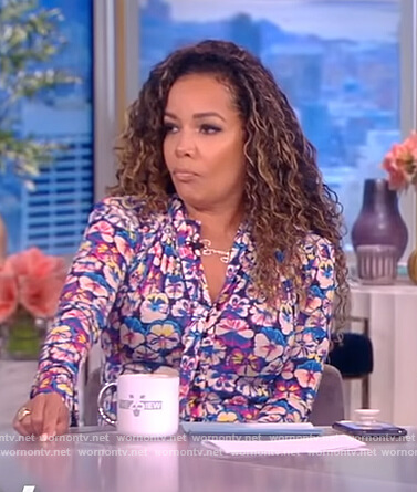 Sunny’s blue floral print long sleeve dress on The View