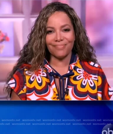 Sunny’s floral print tie neck blouse on The View