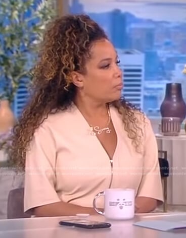 Sunny’s beige v-neck zip front jumpsuit on The View