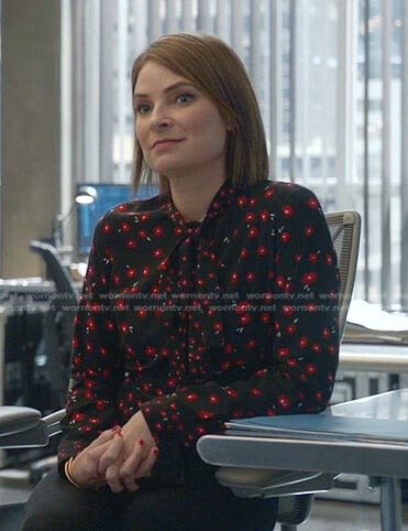 Taylor’s black floral tie neck blouse on Bull