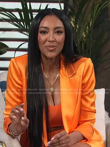 Tayshia’s orange satin blazer and shorts on E! News Daily Pop