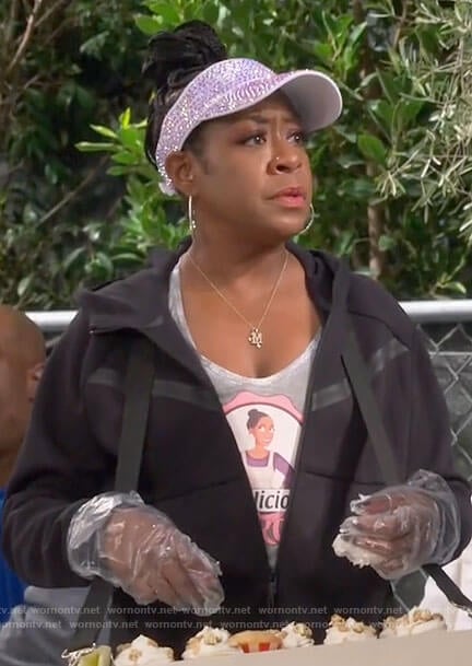 Tina’s black zip hoodie on The Neighborhood