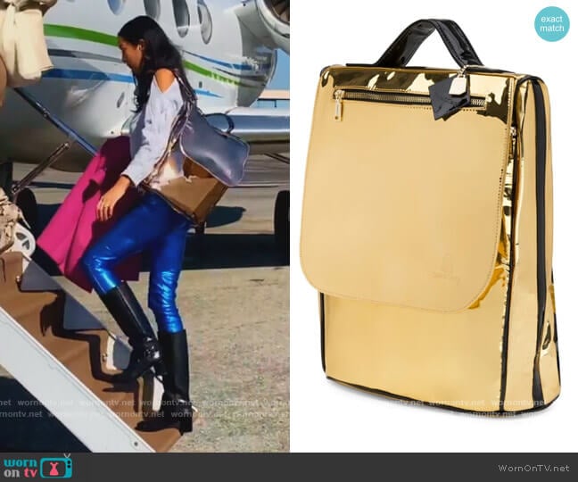 Tote and Carry Apollo Bag in Gold worn by Noella Bergener on The Real Housewives of Orange County